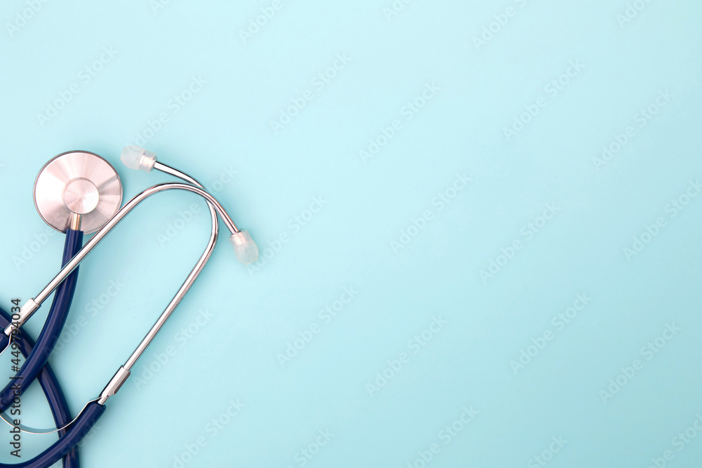 close up stethoscope on a blue background , medical health care concept