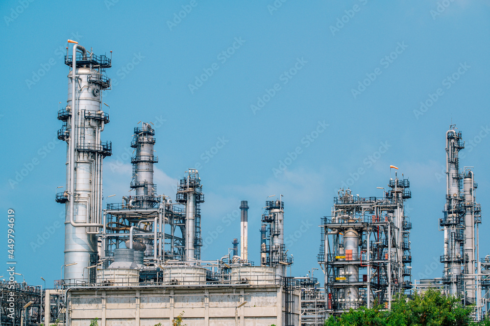 Industrial zone,The equipment of oil refining,Close-up of industrial pipelines of an oil-refinery plant,Detail of oil pipeline with valves in large oil refinery. Industrial zone,The equipment of oil refining,Close-up of industrial pipelines of an oil-refinery plant,Detail of oil pipeline with valves in large oil refinery.