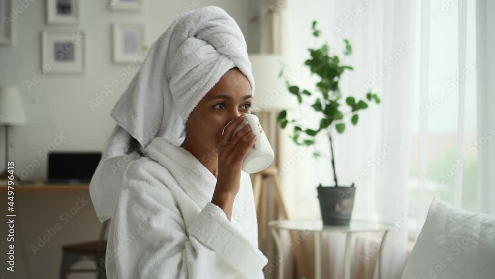 Beauty skin care bath taking lady drinks tea on bed in room Spbd Beauty skin care bath taking lady drinks tea on bed in room Spbd