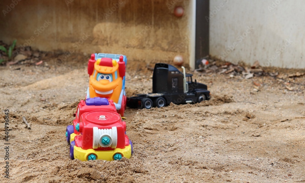Obraz premium children's cars in the sandbox