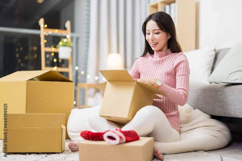 woman open online shopping parcel woman open online shopping parcel