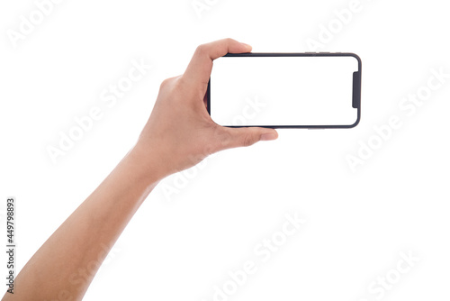 Hand holding smart phone blank screen. Woman hand holding smartphone isolated on white background. Smart phone white screen.