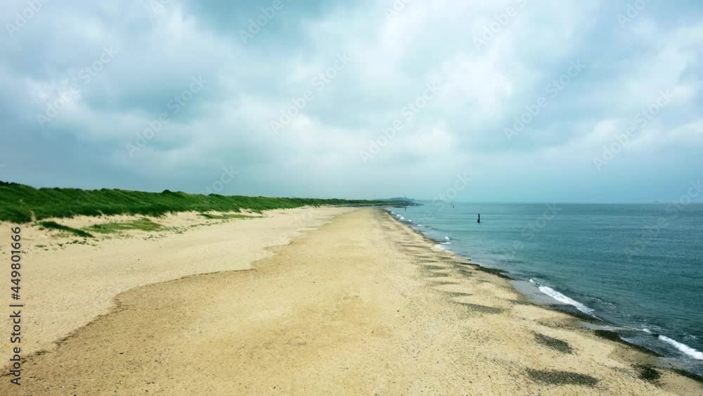 Beautiful landscape shot of a typical British sand beach with no people Beautiful landscape shot of a typical British sand beach with no people