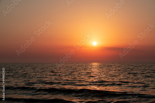 The sun reflecting in the sea water after sunrise