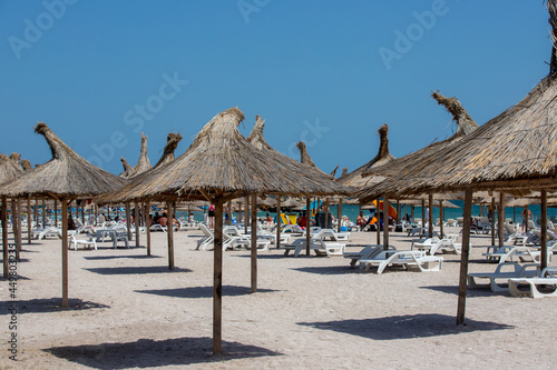 Umbrellas on the beach in Saturn resort - Romania 02.Aug.2021 Black sea beach on a summer day 