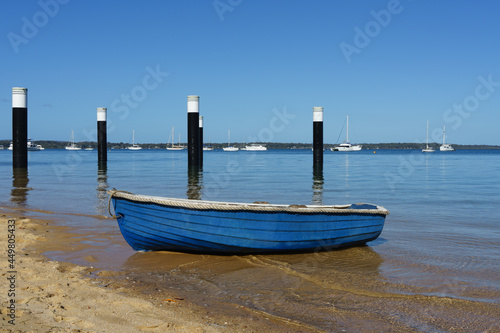 Blue row boat on the beach on Coochiemudlo Island 