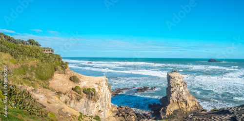 Muriwai Gannet Colony, on the west coast of the Auckland, New Zealand. black sand surf beach and surrounding area is popular for locals and tourists. Gannets nest there in a large colony on the rocks