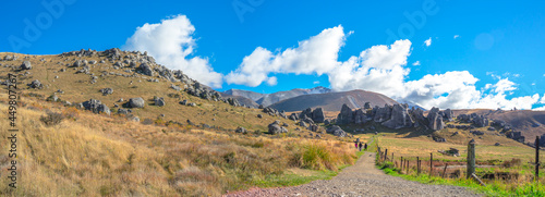 Panoramic view of Castle Hill on sunshine day. Majestic limestone rock formations at Castle Hill, Canterbury, South Island of New Zealand.