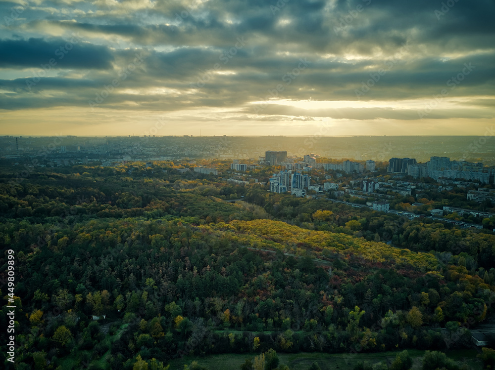 Aerial over the city in autumn at sunset. Kihinev city, Moldova republic of.