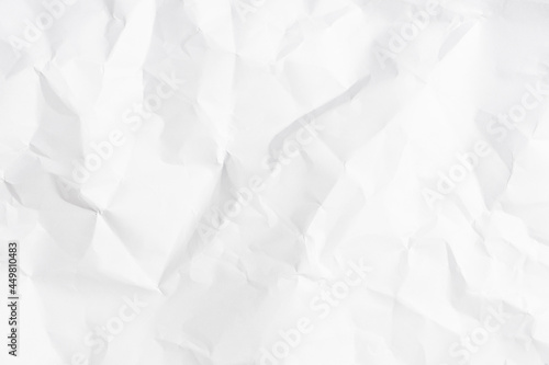 White crumpled paper texture background.