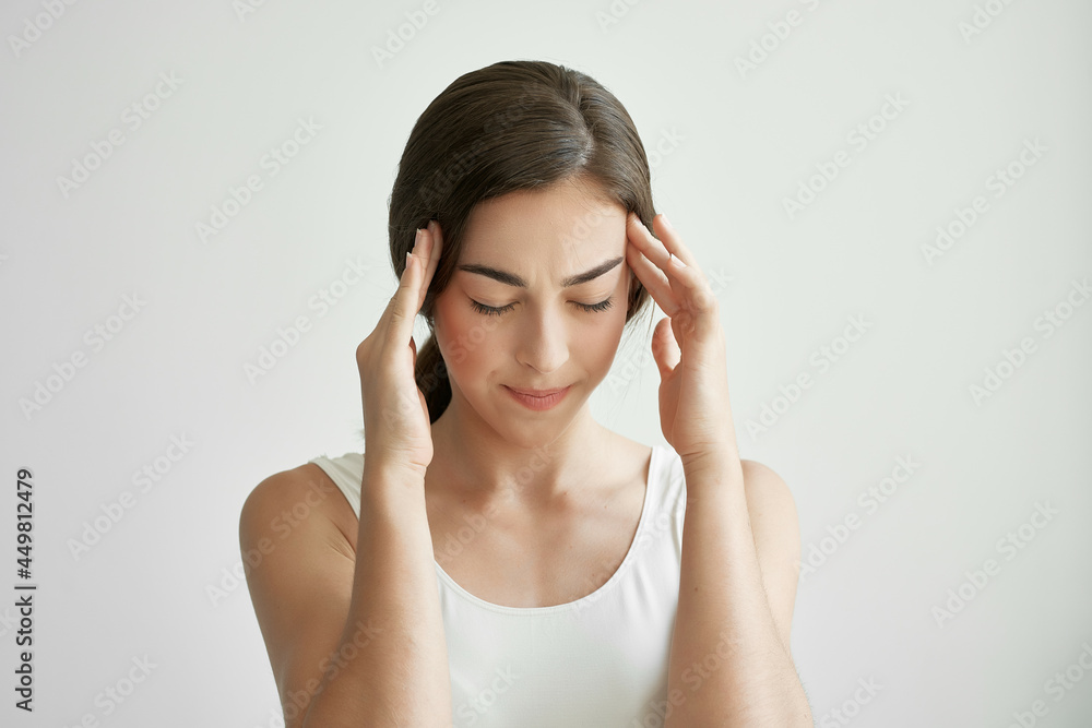 woman holding her head migraine health problems stress negative woman holding her head migraine health problems stress negative