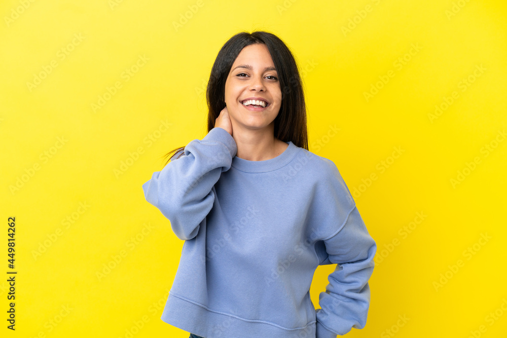 Young caucasian woman isolated on yellow background laughing Young caucasian woman isolated on yellow background laughing