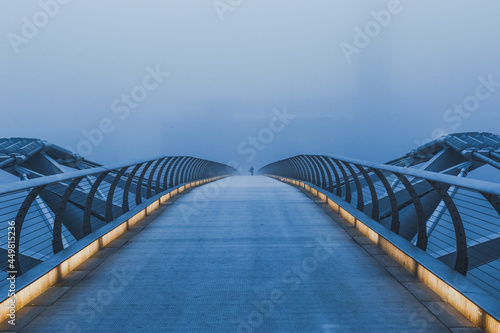 London's Millennium Bridge on a morning of heavy fog photo