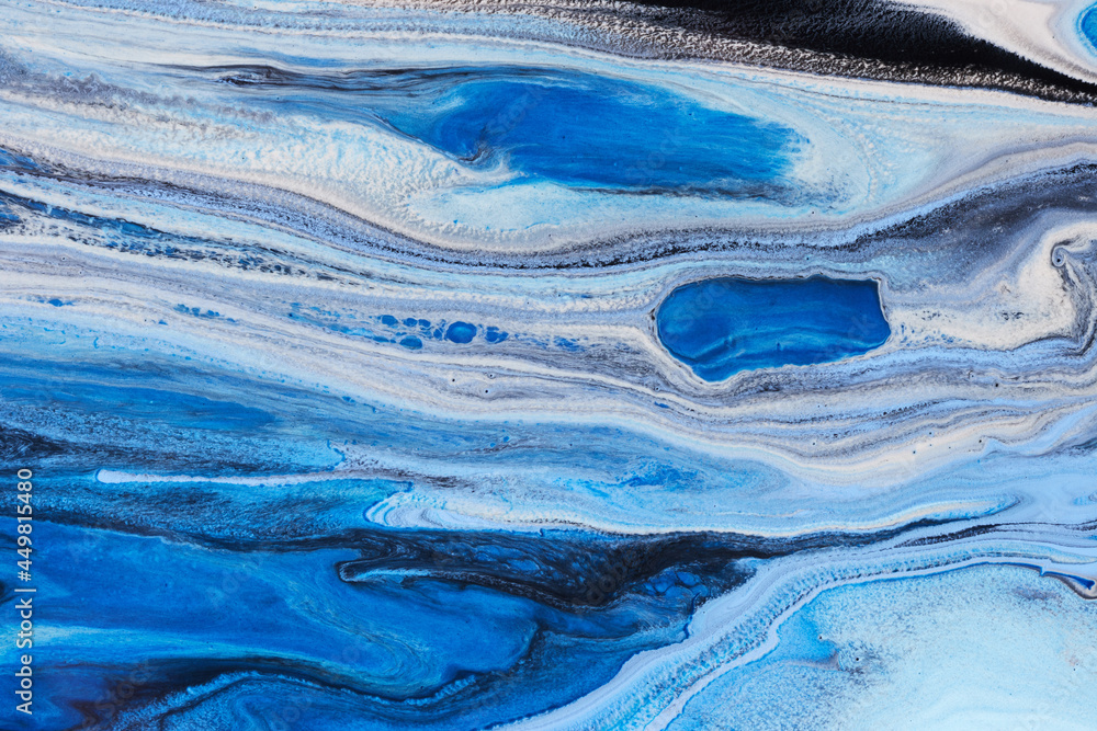 Blue flowing paints texture background Blue flowing paints texture background