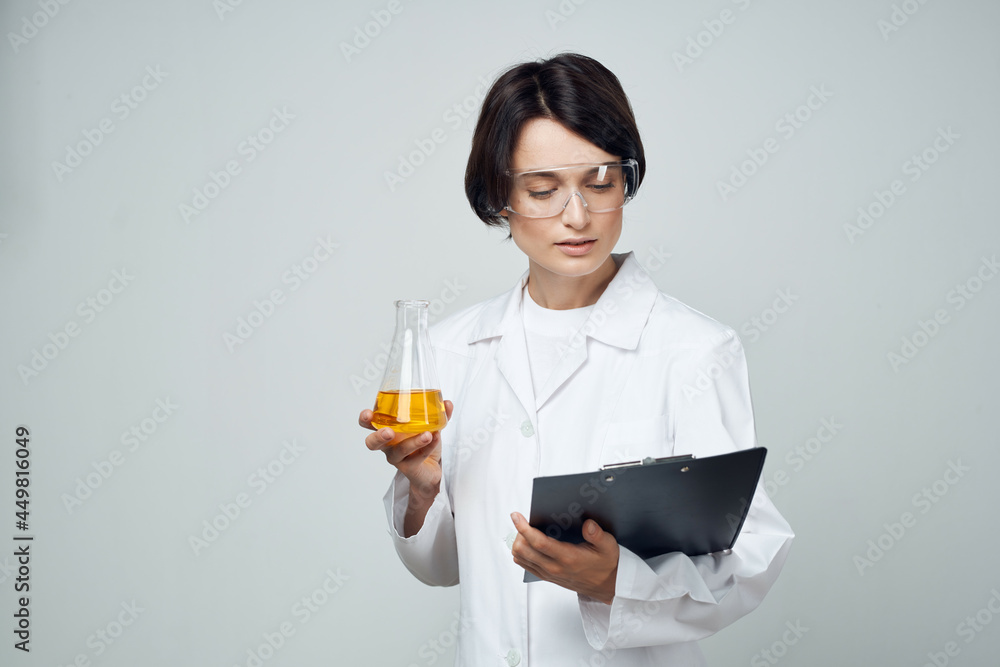 woman laboratory assistant testing analysis research science