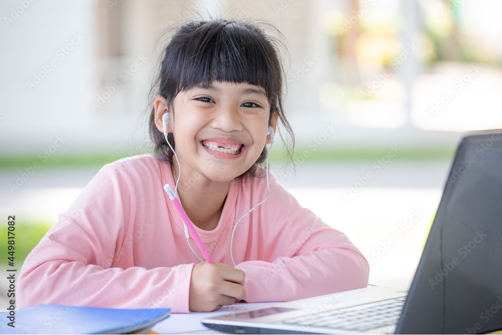 Asian girl students online learning class study with laptop at home.