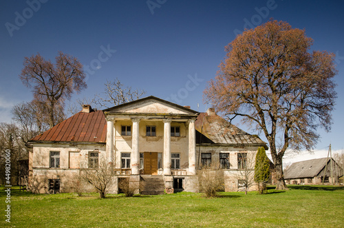Macitajmuiza manor near Kandava in sunny spring day, Latvia. © Bargais
