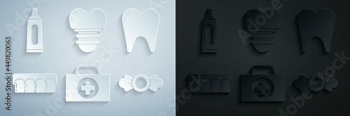 Set First aid kit, Tooth, Dentures model, Candy, Dental implant and Tube of toothpaste icon. Vector