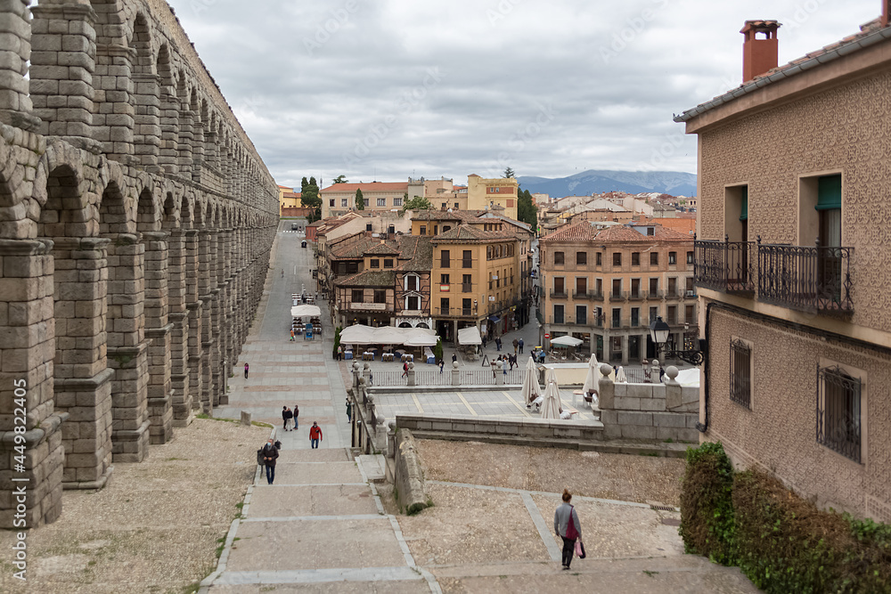 View at the Plaza Oriental and Towering Roman aqueduct and grand landmark monument of Segovia, on Segovia downtown
