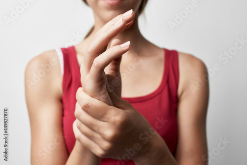 woman with joint pain in fingers arthritis rheumatism photo