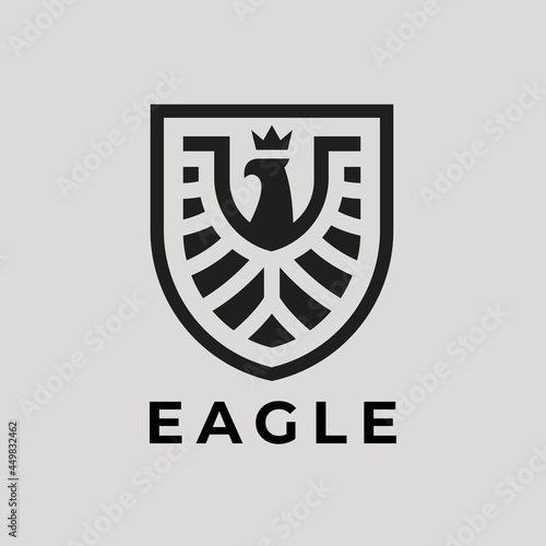 Eagle shield logo icon. Abstract hawk badge symbol. Phoenix bird emblem. Vector illustration.