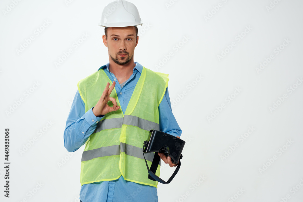 man in working uniform building vr glasses man in working uniform building vr glasses