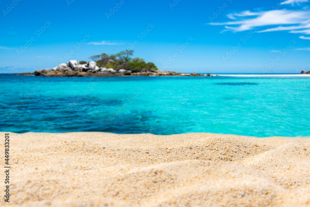 white sand and beautiful tropical beach; Background image for product placement.