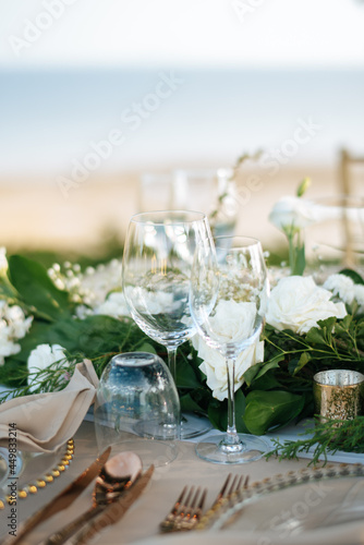 Table setting at a luxury wedding and Beautiful flowers on the table.