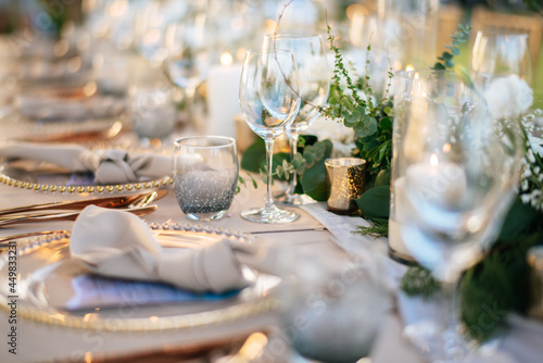Table setting at a luxury wedding and Beautiful flowers on the table.