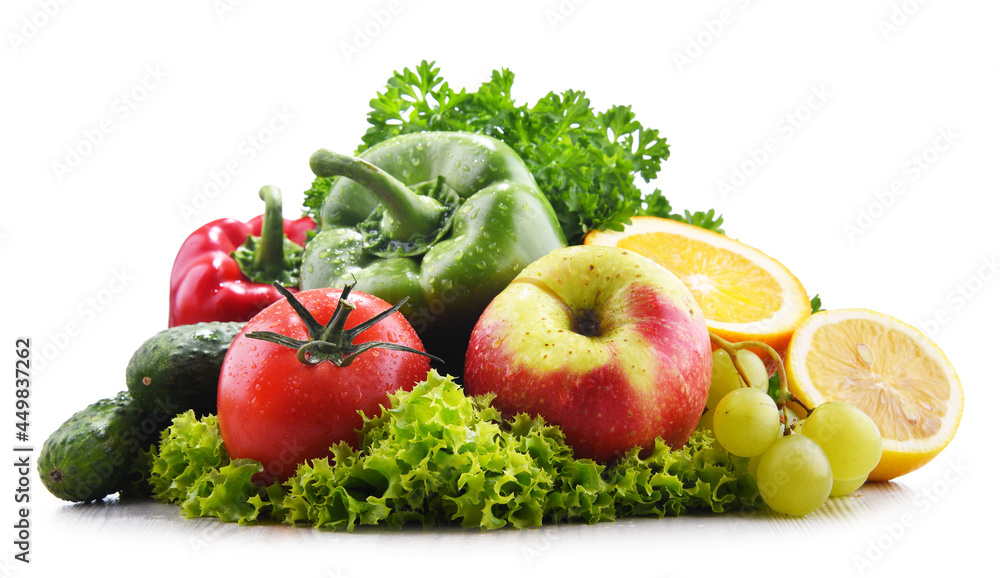 Composition with fresh vegetables and fruits isolated on white Composition with fresh vegetables and fruits isolated on white