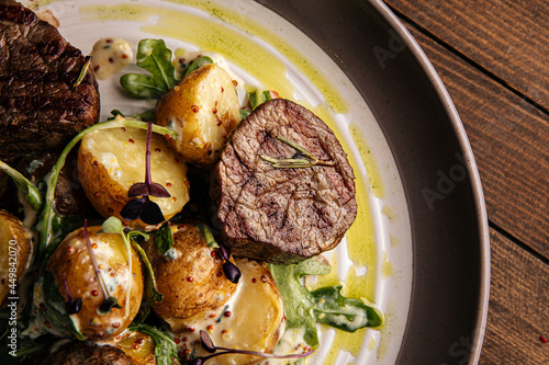 Vászonkép Closeup on a plate of gourmet fillet mignon steaks with potatoes