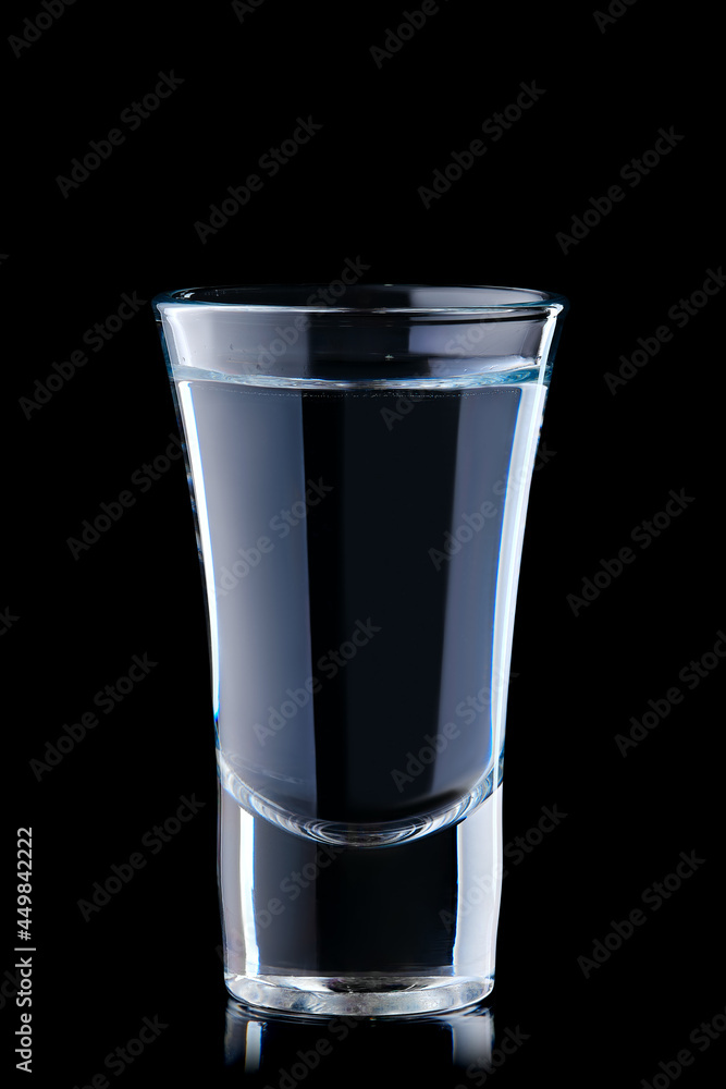 Shot with vodka isolated on black Shot with vodka isolated on black