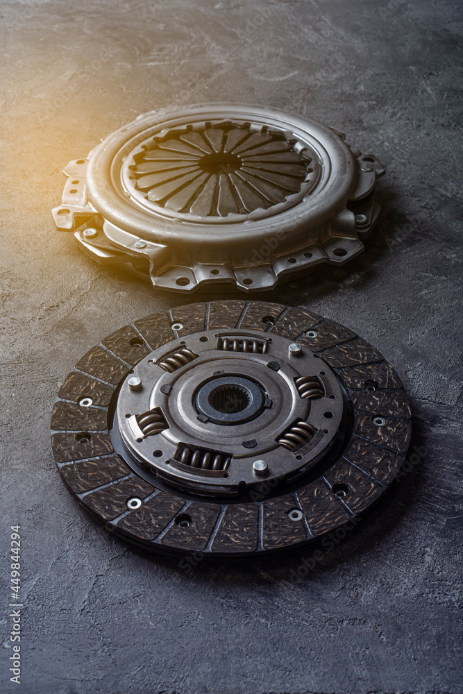 New clutch kit on a dark background. Vertical photography.