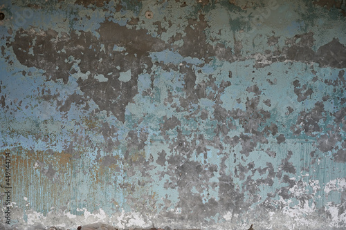 Texture of an old wall with peeling paint