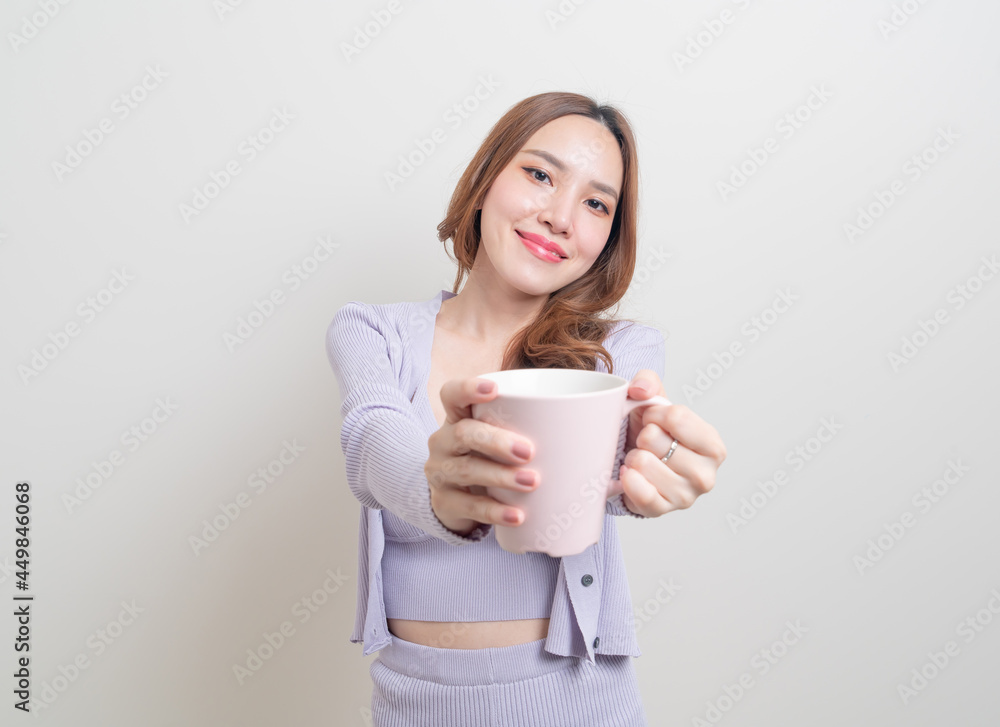 portrait beautiful Asian woman holding coffee cup or mug portrait beautiful Asian woman holding coffee cup or mug