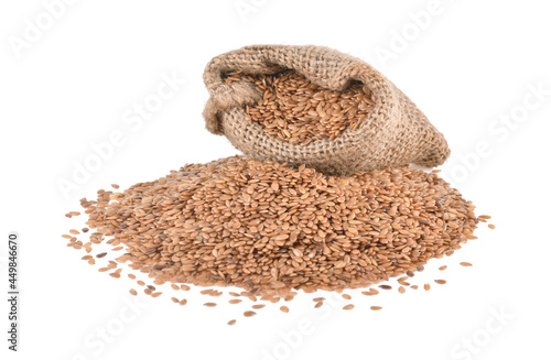 flax seeds in bag isolated on white background.