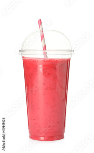 Delicious smoothie with straw in plastic cup isolated on white