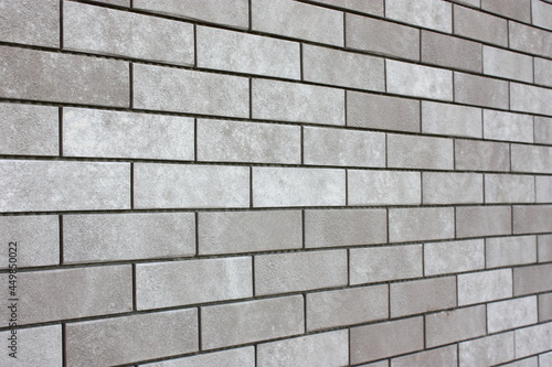 Billede på lærred House wall clad with brick slips