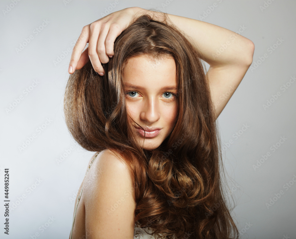 Fototapeta premium Beautiful young woman smiling and looking at camera