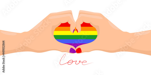Hands forming a heart with rainbow color. Heart in the color of the rainbow as a symbol of tolerance and LGBT pride.