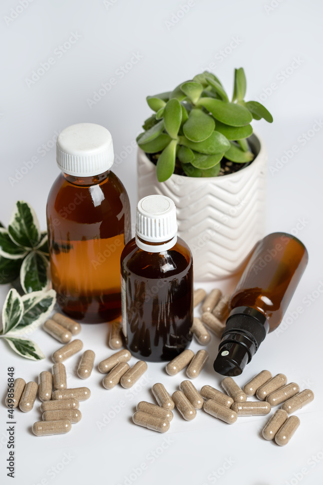 Vitamine capsules and oils on a white background Vitamine capsules and oils on a white background