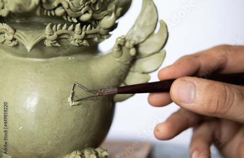 Obraz na płótnie Artist creates a sculpture made of wax