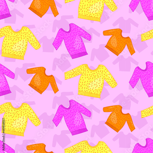 Cosy sweaters with pink background seamless pattern