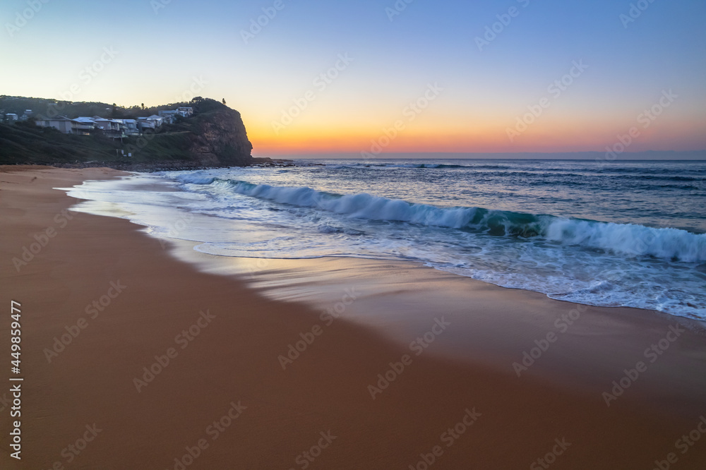 Fototapeta premium Clear skies aerial sunrise at the beach