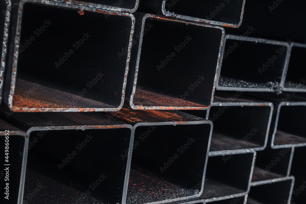 Stack of rolled metal products, steel pipes Stack of rolled metal products, steel pipes