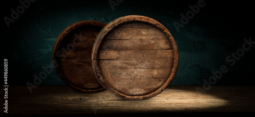 Old wooden barrel on a brown background