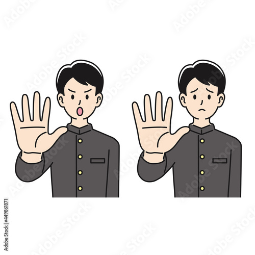 ストップするポーズをする男子高校生