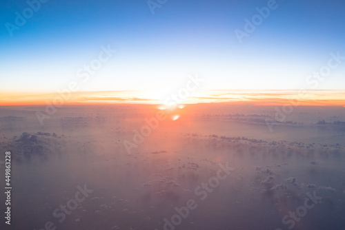 the sunrise on a plane