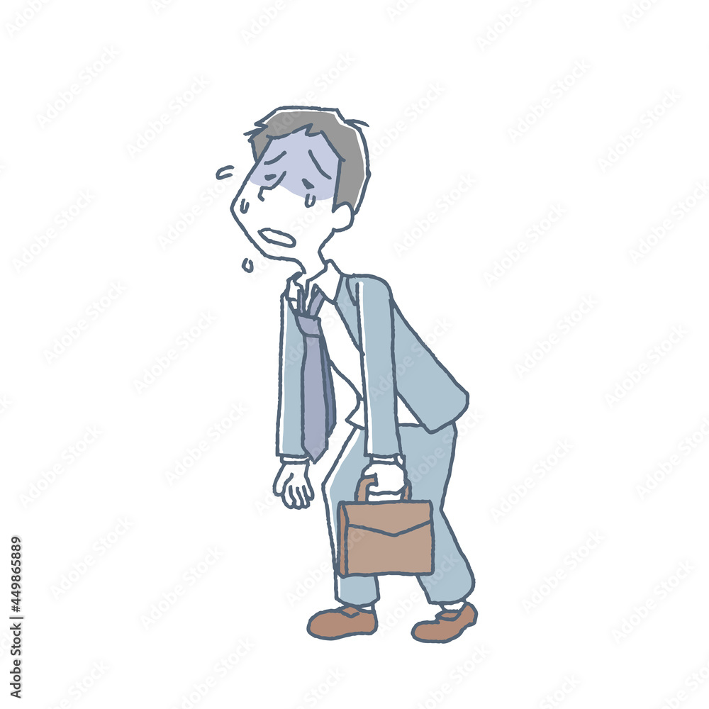 疲れ果てて帰宅する男性会社員 疲れ果てて帰宅する男性会社員