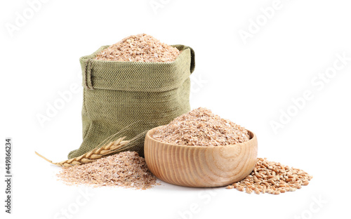Wheat bran in sack and bowl on white background